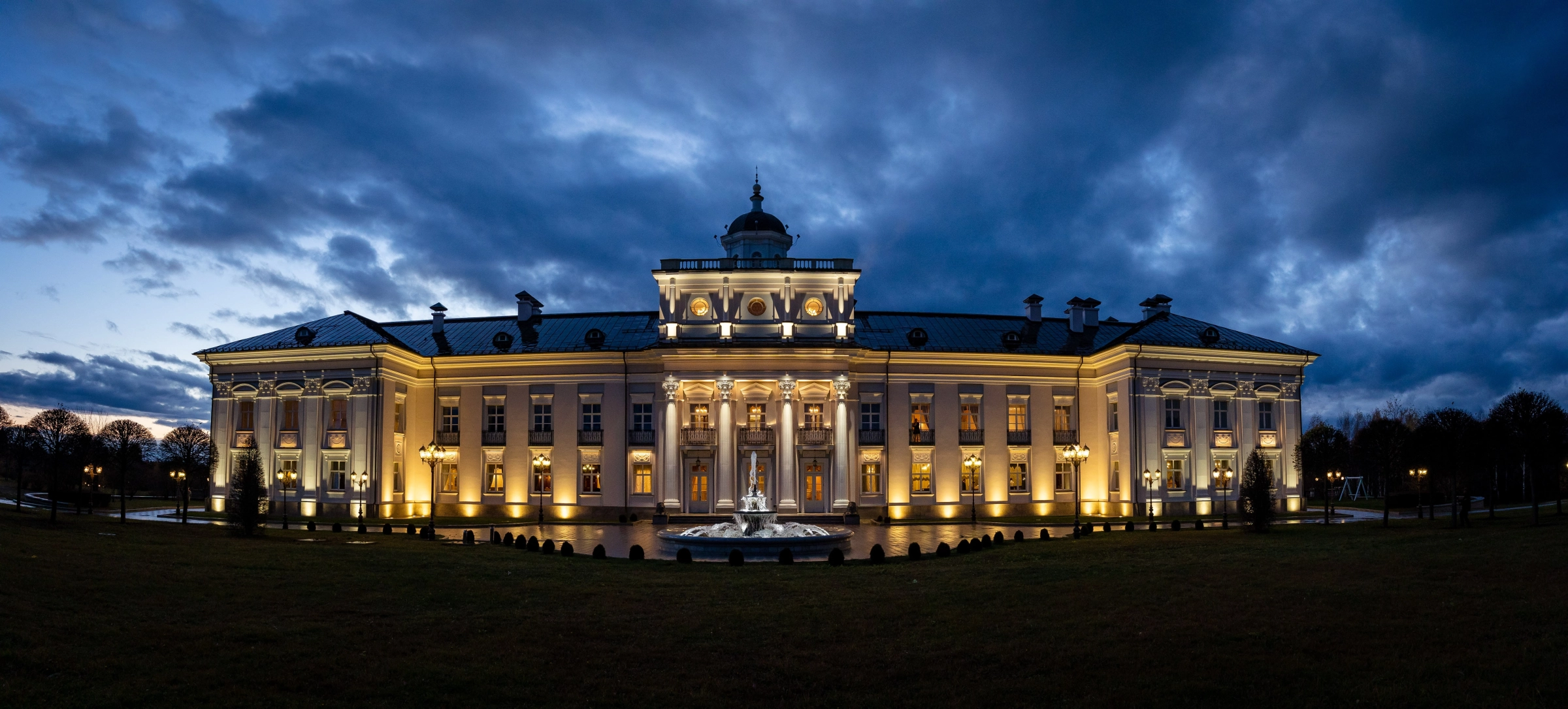 Palace facade blue dusk warm architectural golden lighting dome