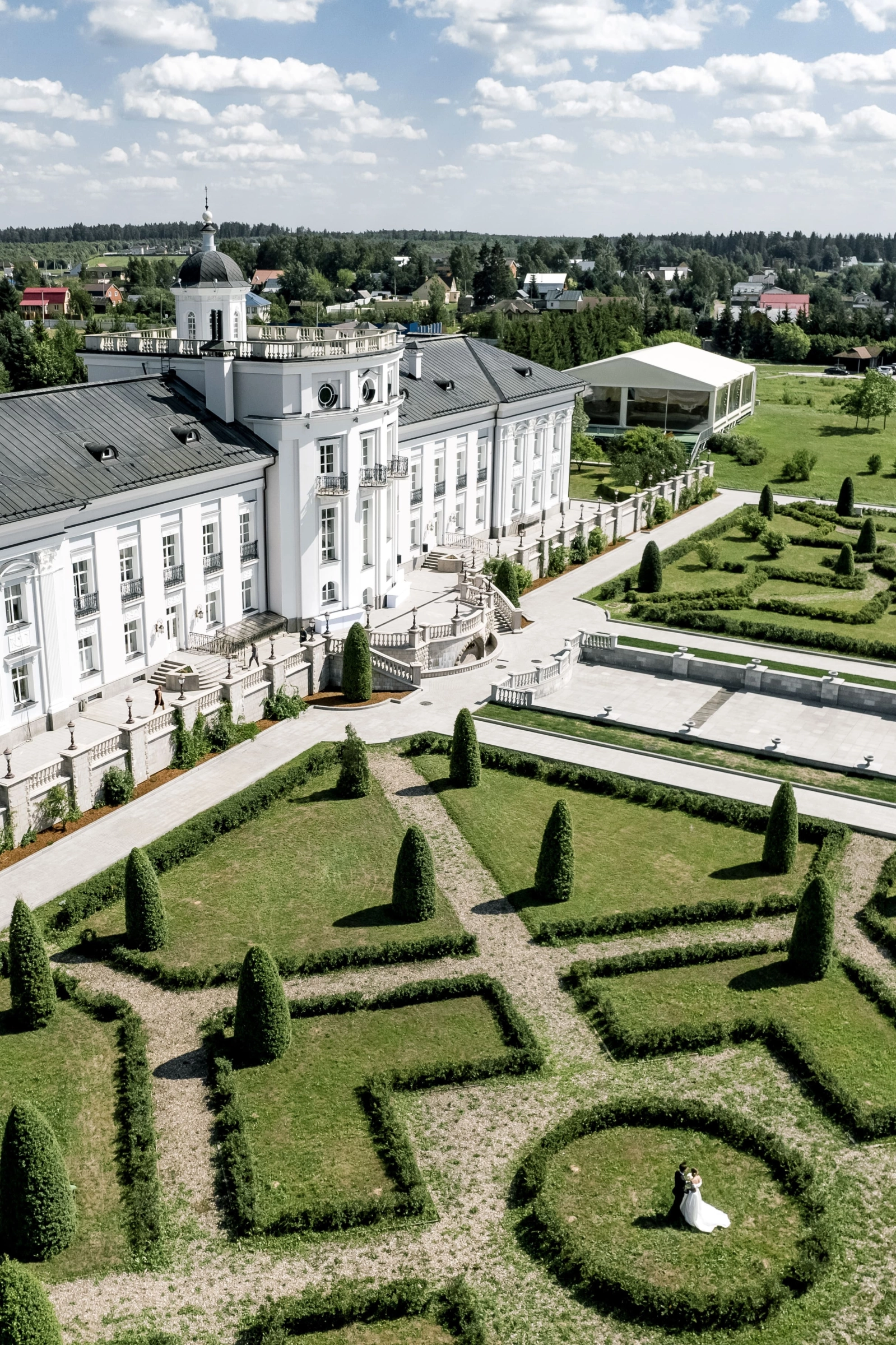 Aerial drone estate formal gardens geometric hedge maze patterns