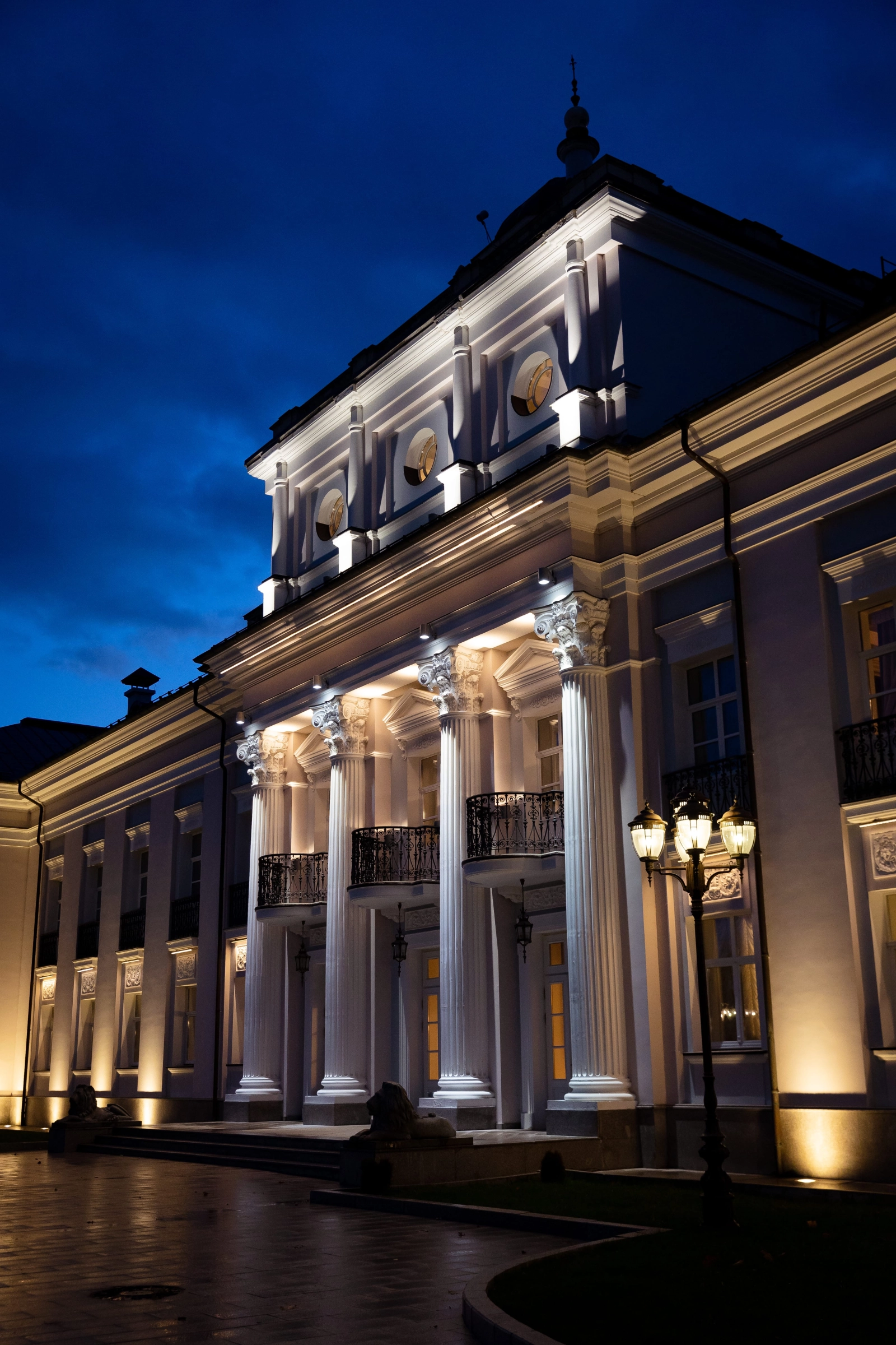 Palace facade blue twilight architectural golden lighting design