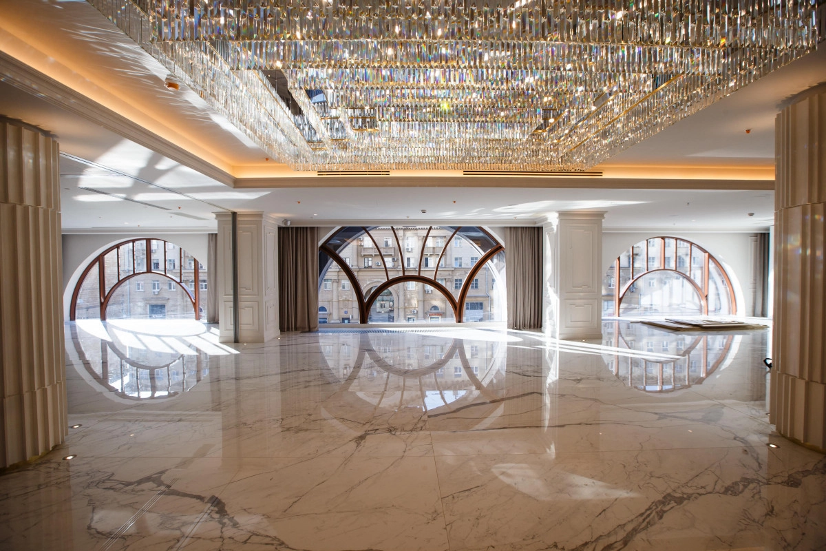Grand ballroom crystal chandelier marble flooring luxury venue