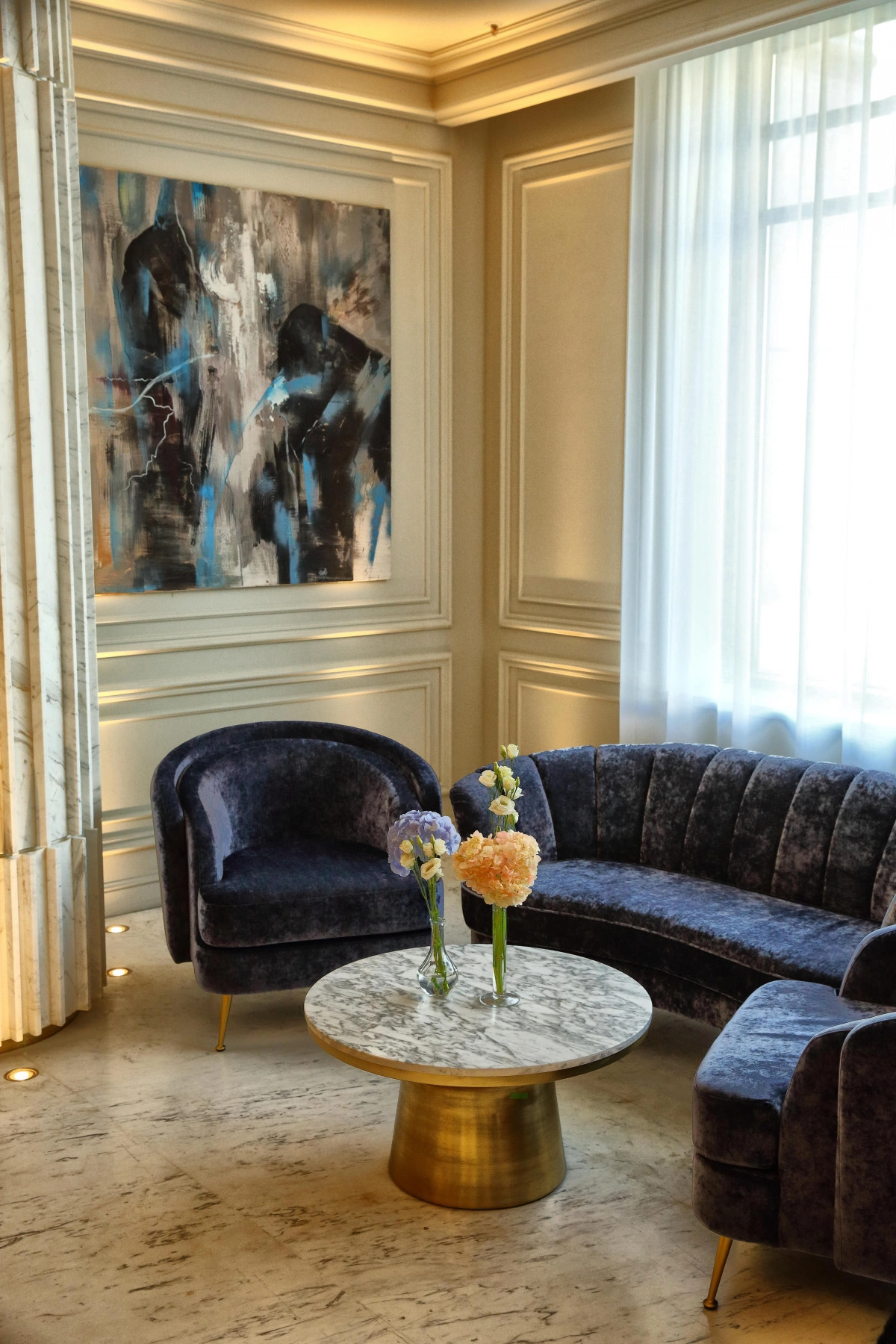 Luxury lounge blue velvet seating gold accents venue