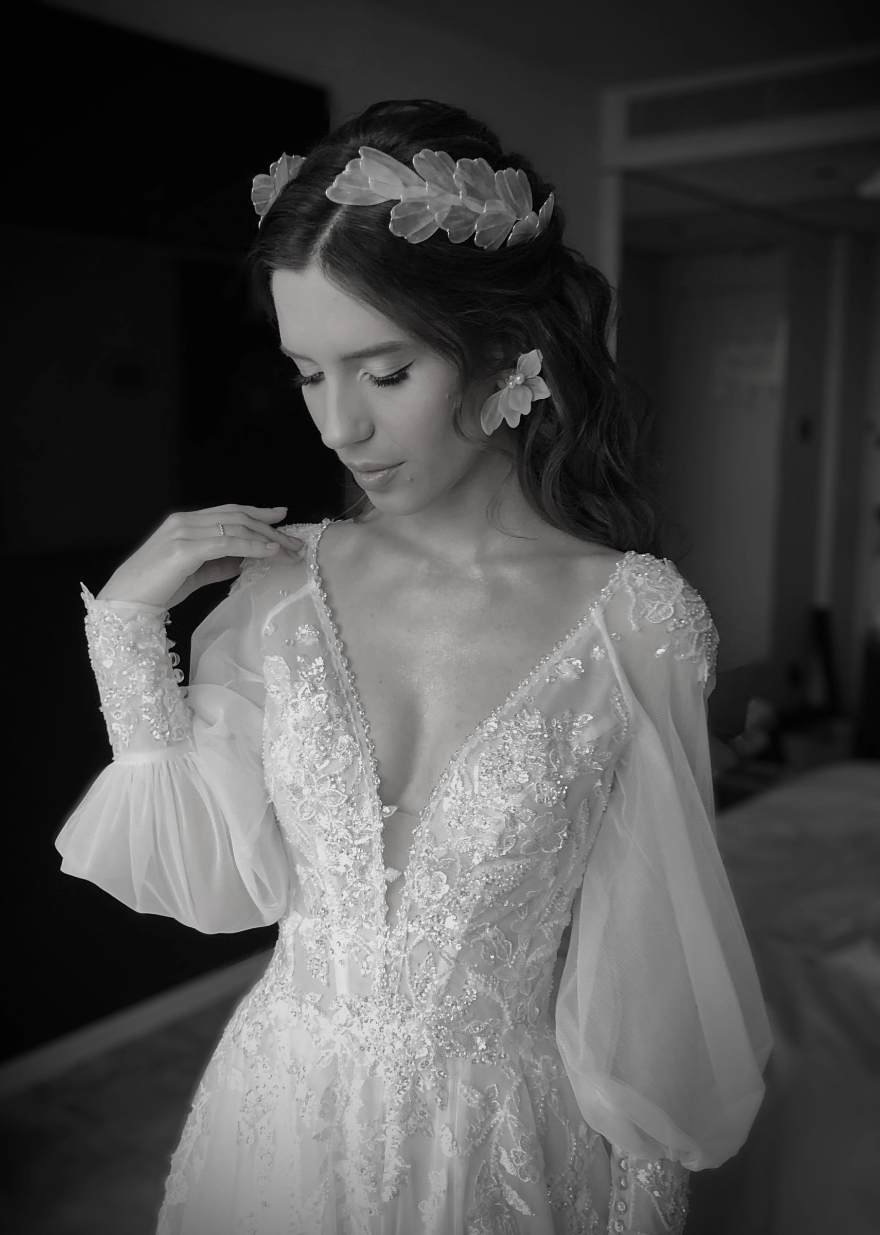 Ornate beaded lace dress with floral crown bridal