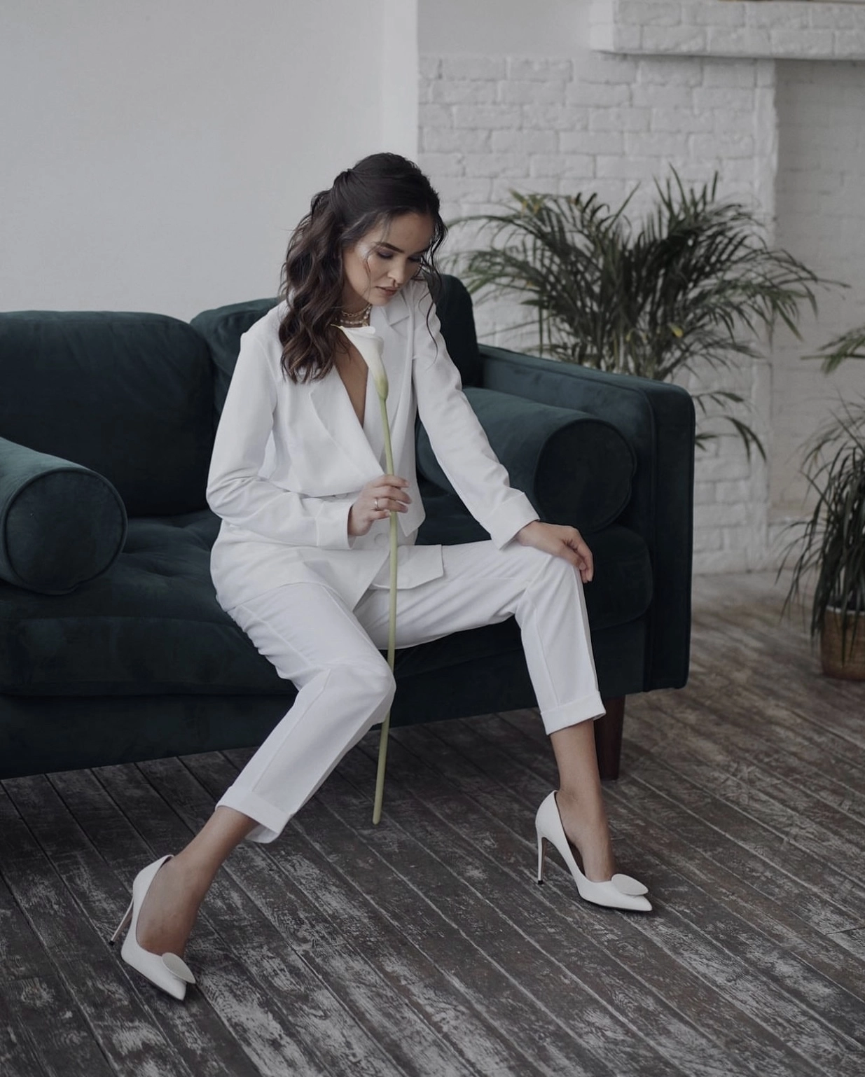 White pantsuit modern bridal styling contemporary interior